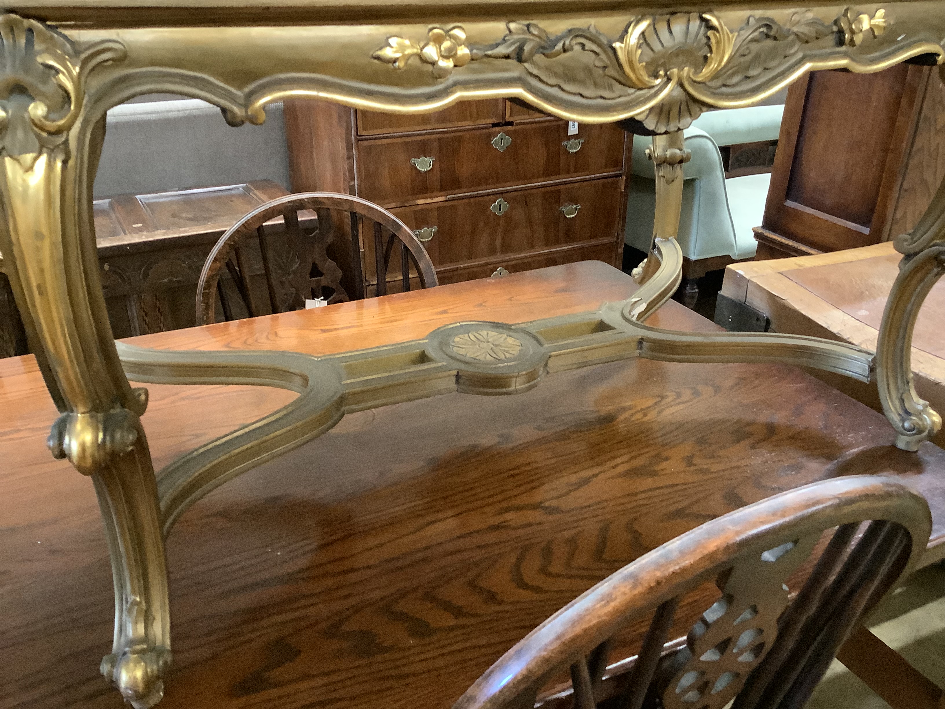 A circular gilt metal low coffee table with variegated marble top, diameter 62cm together with a larger faux marble coffee table